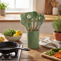 Avocado Green Silicone Kitchenware Cooking Utensils Set on a kitchen counter